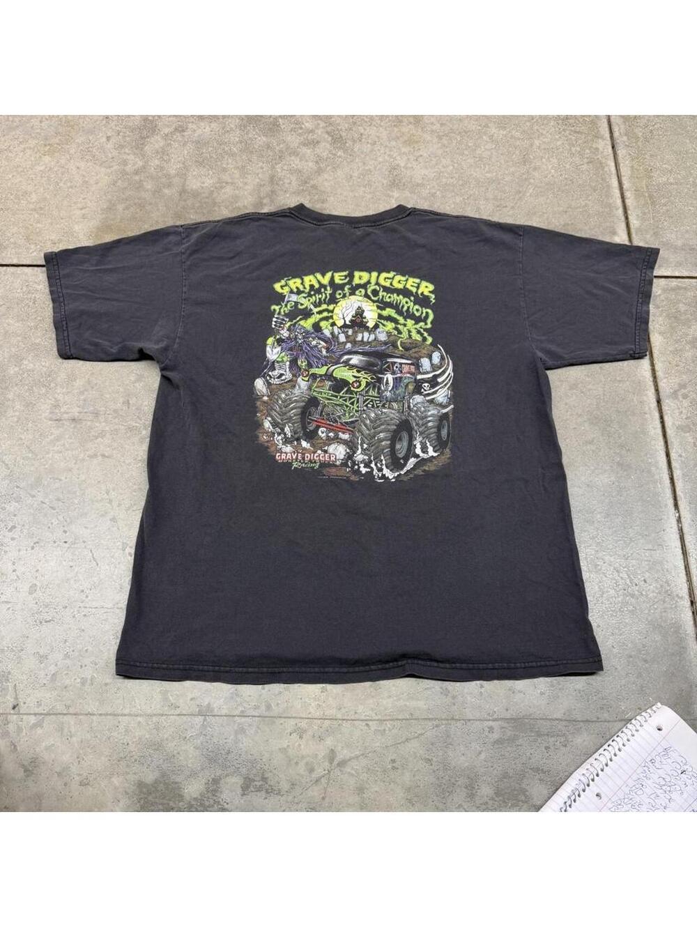 vintage grave digger spirit of a champion monster truck faded black shirt